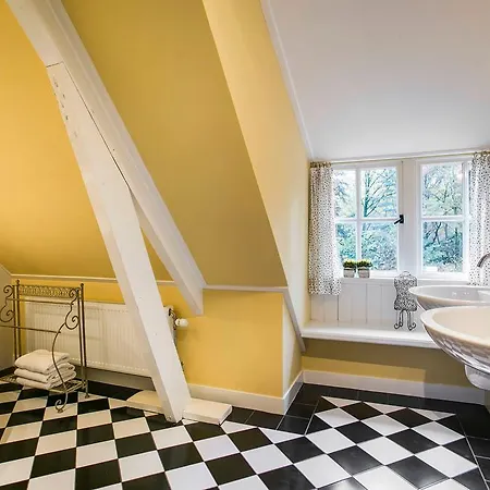 Vakantiehuis Koetshuis De Baakse Kamp